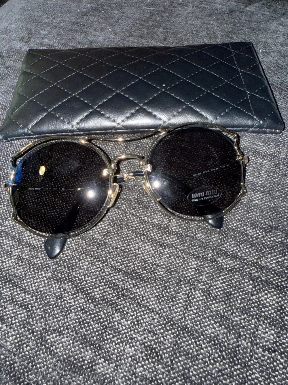 Miu Miu Gold Frame Sunglasses with Black Lenses
